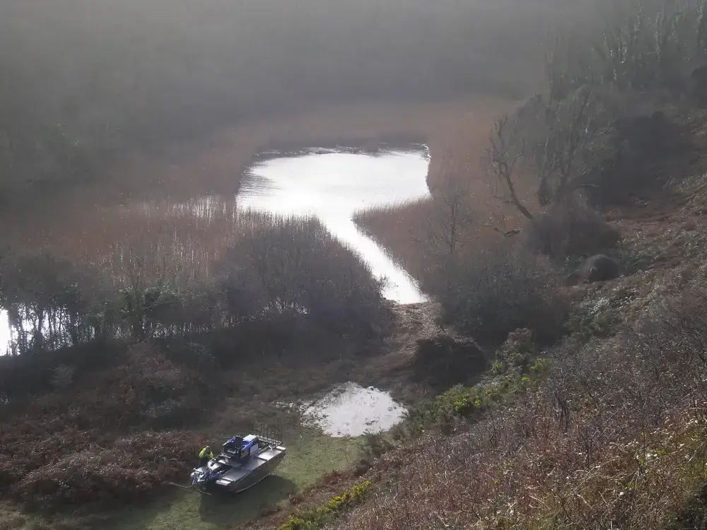 Completed wading pools creating open water within the National Trust reed bed
